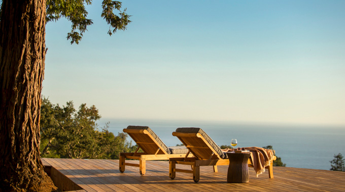 Loungers overlooking the ocean at Alila Ventana Big Sur.