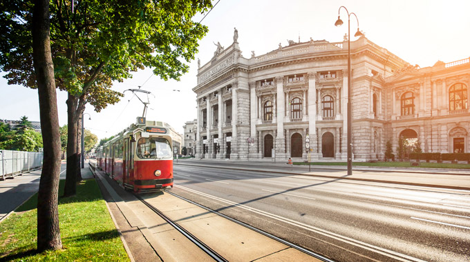 A cable car passing the Burgtheater in Vienna