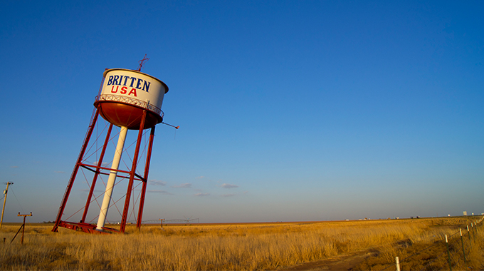 The Leaning Tower of Britten leans over in a field near Route 66.