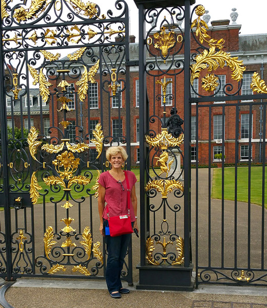 AAA Travel Agent Allison Walker in front of Kensington Palace