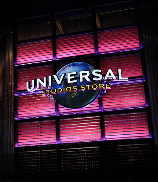 Front of the Universal Orlando Resort store at CityWalk lit up pink