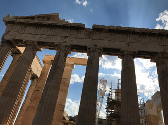 A backlit view of the Parthenon