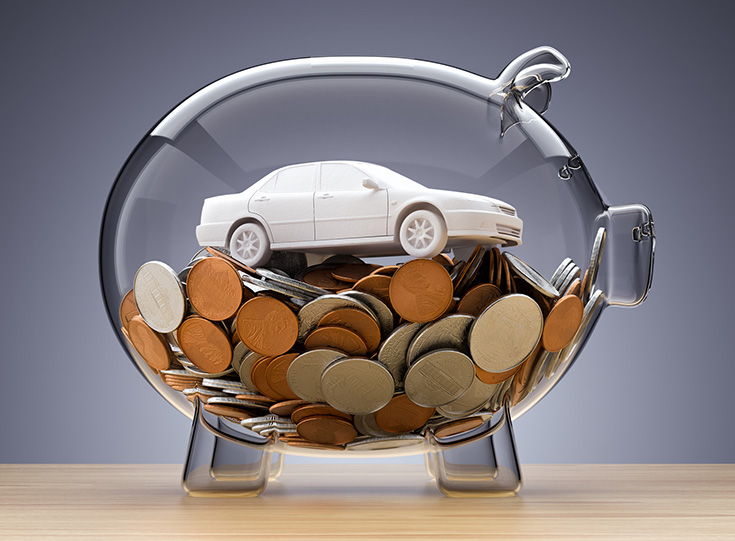 1186061669 Model Car On Money Inside Transparent Piggy Bank 735x541 