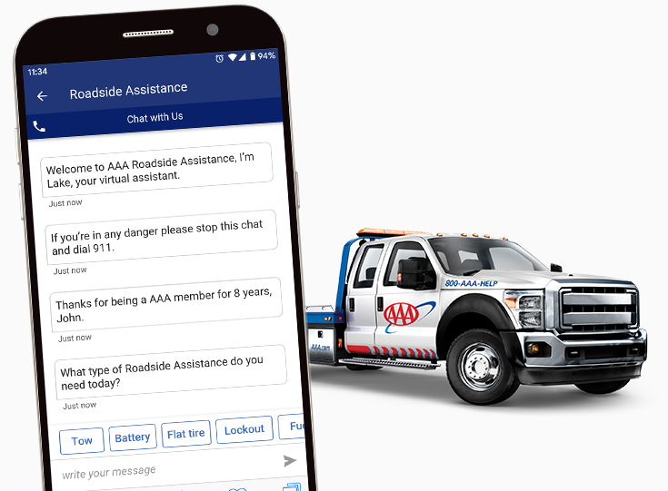 AAA Virtual Assistant on a mobile phone in front of a AAA tow truck