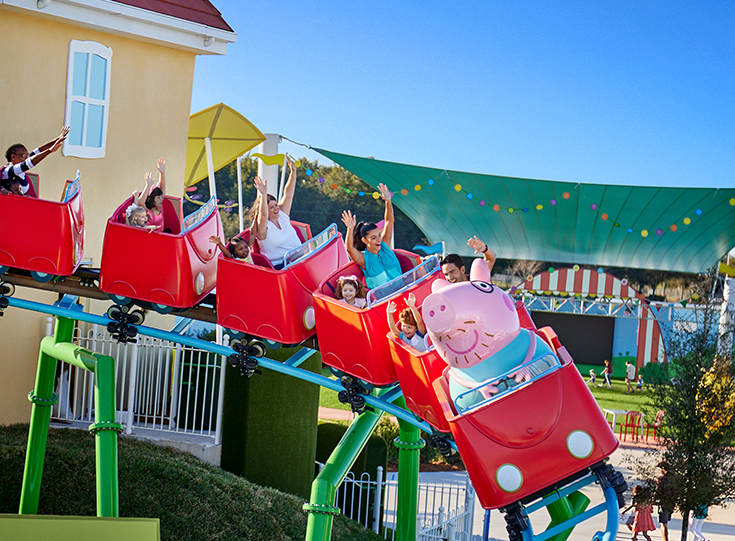 Daddy's pig roller coaster at Peppa Pig Theme Park Daddy's pig roller coaster at Peppa Pig Theme Park