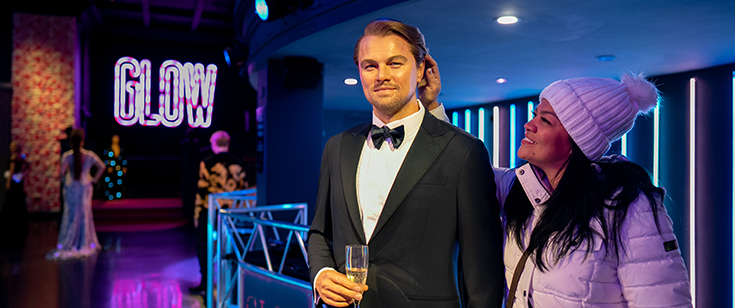 Woman touches Leonardo DiCaprio statue at Maddam Tussauds Woman touches Leonardo DiCaprio statue at Maddam Tussauds