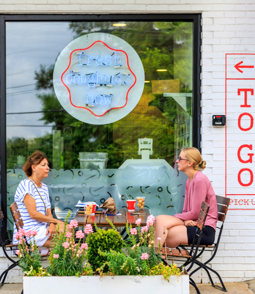 Diners grab a quick snack at Birmingham-based Hero Doughnuts & Buns. | Photo by Art Meripol