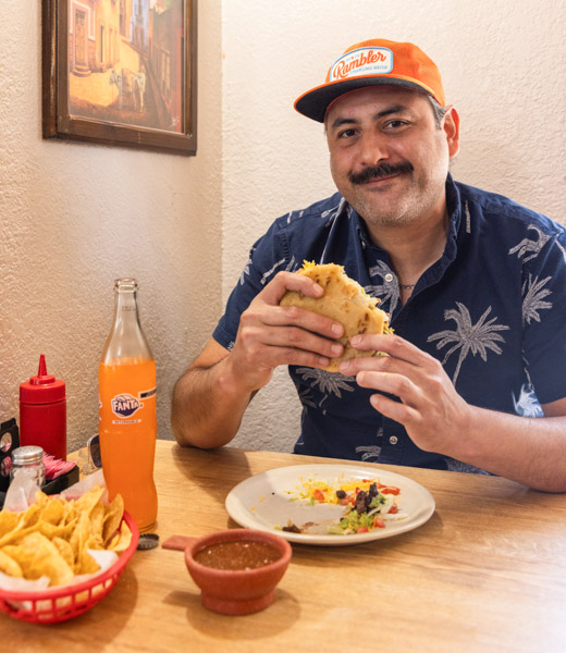 Chef Mike Diaz enjoying a gordita and Fanta at Habanero Cafe.