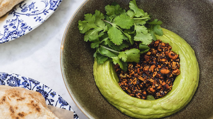 Momed avocado hummus with peanut salsa macha.