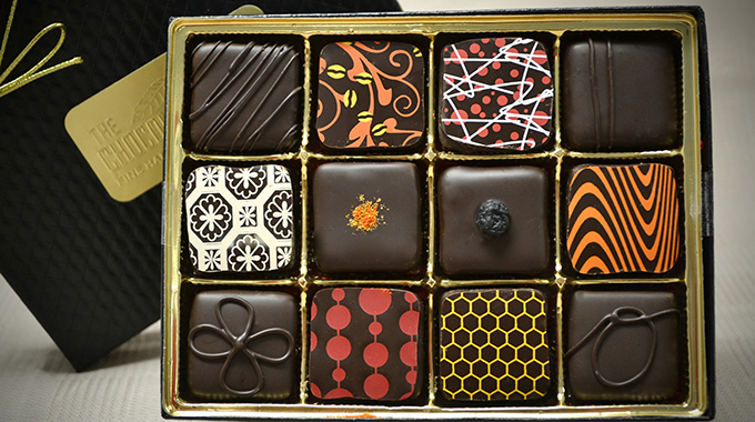 A box of 12 truffles with various designs