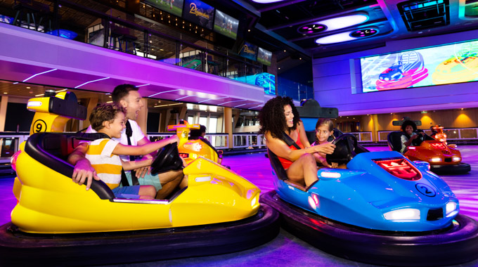 Guests laughing as bumper cars collide