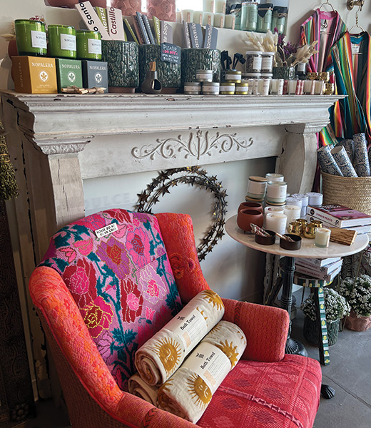 Incense, candles, towels, and other items for sale inside Casa Palma Dulce.