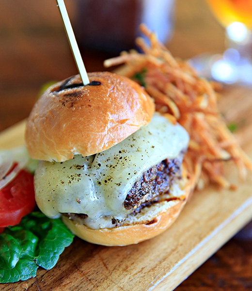 Burger slider with a side of shoestring potatoes 