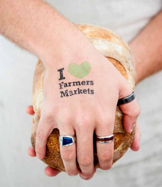 Customer's hand stamped "I love farmers markets"