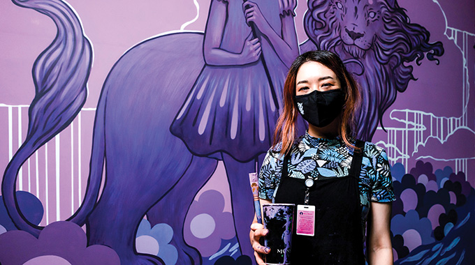 Las Vegas artist Amy Sol in front of her mural. Photo by Lance Aquino