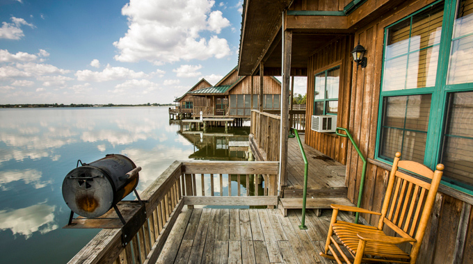 The porch of an over-water cabin at Poverty Point Reservoir State Park.