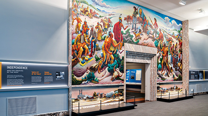 Mural showing Native Americans and American settlers inside the Harry S. Truman Presidential Library and Museum.