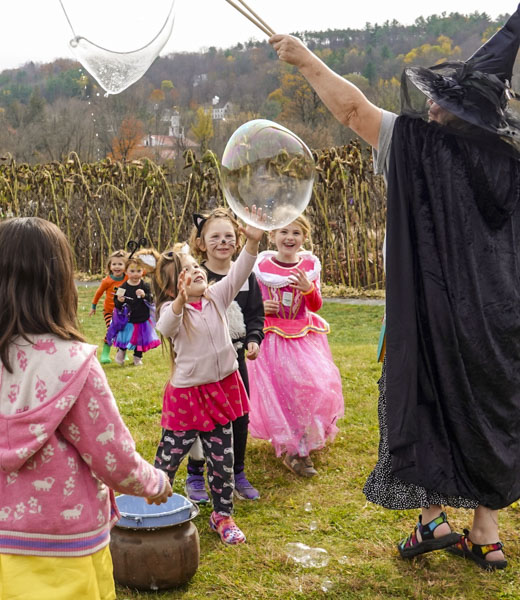 Costumed children with bubbles at Billings Farm.