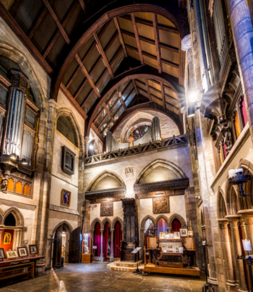 Gothic-inspired interior stop during Candlelight and Spiritualism tour.