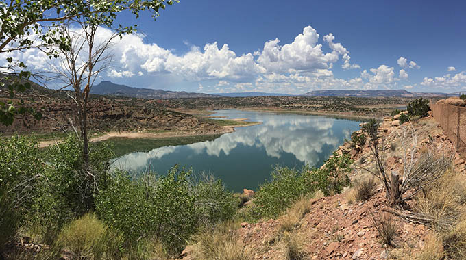 From Abiquiu Lake, a 5,200-acre reservoir, you can drink in a panoramic view of Flint Mountain. | Photo by CQueral/stock.adobe.com 