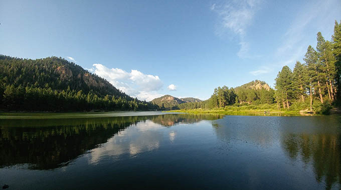 At 7,560 feet, this mellow mountain retreat is an ideal spot for fly-fishing in the summer and ice fishing in the winter. | Photo courtesy New Mexico State Parks 