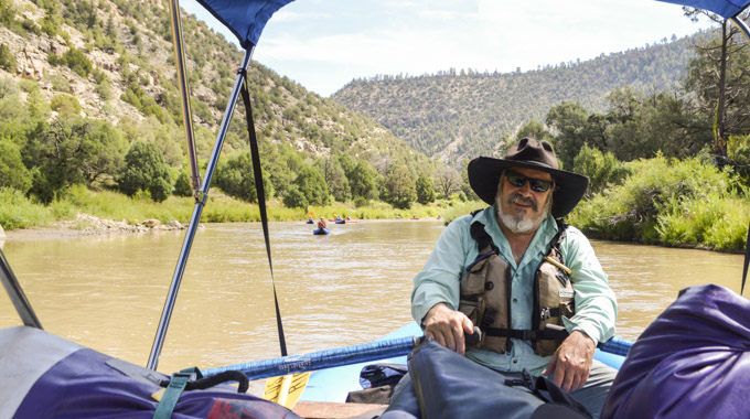 Cisco Guevara of Los Rios River Runners rowing a raft.