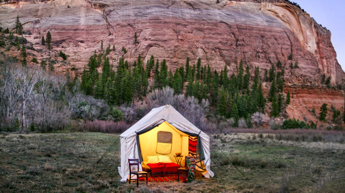 Comfort Camp tent lit up.