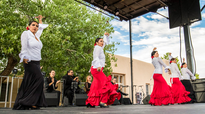 Five female flamenco dancers onstage