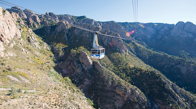 The aerial Sandia Peak Tramway stretches from the northeast edge of Albuquerque to Sandia Peak on the ridgeline of the Sandia Mountains. | Photo by Steve Larese