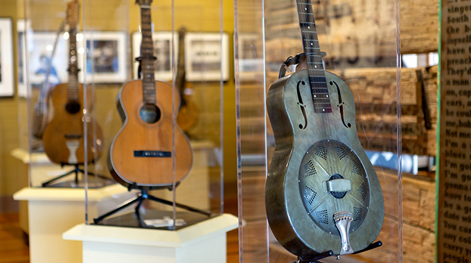 Guitars inside glass cases at the Delta Blues Museum.