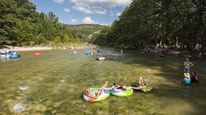 Floating in inner tubes on the Frio River in the Texas Hill Country. | Photo courtesy Visit Uvalde County