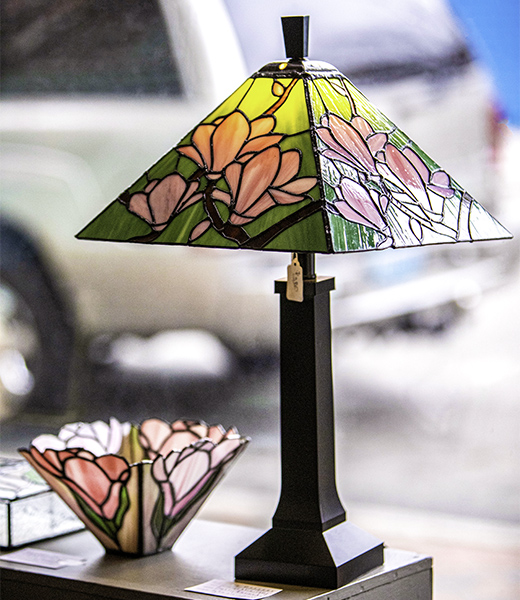 Sally Kennedy's stained glass lamps are featured at the Uptown Gallery. | Photo by Stanley Watkins