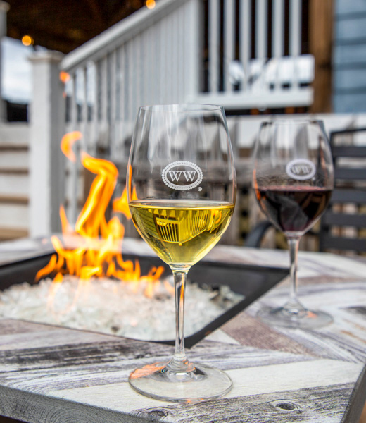 At Williamsburg Winery, enjoy a glass or 2 on the 2-level deck or by the firepit on the pavilion before heading to Wedmore Place, a 28-room hotel that blends authenticity with modern amenities. | Photo by Consociate Media
