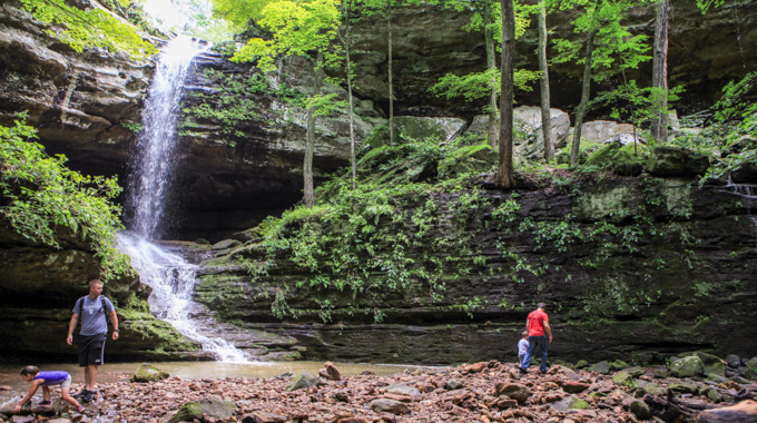 Visitors exploring Bork's Waterfall.